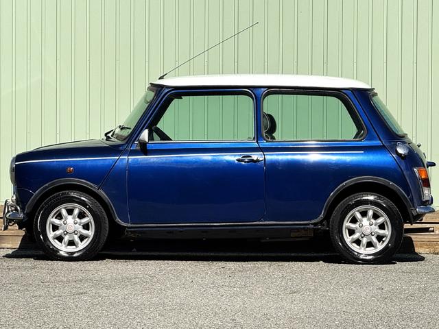 MINI クーパー /禁煙車/革シート/エアコン動作確認/天張り垂れ無し/ETC/12インチクーパーホイール/革巻きステアリング/ウッド調パネル/(16枚目)