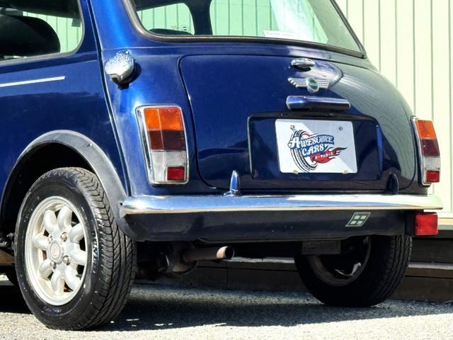 MINI クーパー /禁煙車/革シート/エアコン動作確認/天張り垂れ無し/ETC/12インチクーパーホイール/革巻きステアリング/ウッド調パネル/(21枚目)