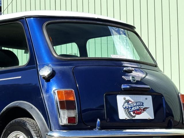 MINI クーパー /禁煙車/革シート/エアコン動作確認/天張り垂れ無し/ETC/12インチクーパーホイール/革巻きステアリング/ウッド調パネル/(22枚目)