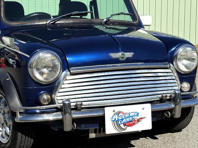 MINI クーパー /禁煙車/革シート/エアコン動作確認/天張り垂れ無し/ETC/12インチクーパーホイール/革巻きステアリング/ウッド調パネル/(25枚目)