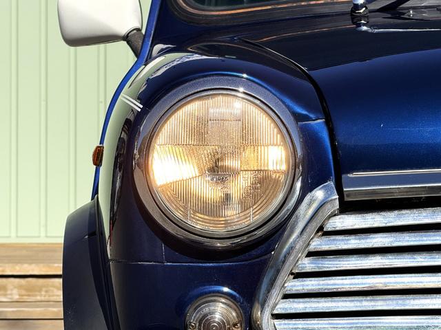 MINI クーパー /禁煙車/革シート/エアコン動作確認/天張り垂れ無し/ETC/12インチクーパーホイール/革巻きステアリング/ウッド調パネル/(26枚目)