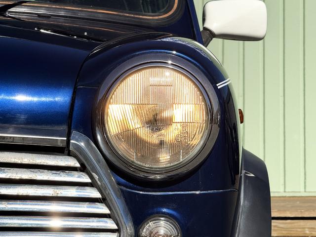 MINI クーパー /禁煙車/革シート/エアコン動作確認/天張り垂れ無し/ETC/12インチクーパーホイール/革巻きステアリング/ウッド調パネル/(27枚目)