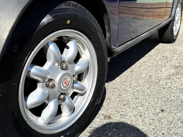 MINI クーパー /禁煙車/革シート/エアコン動作確認/天張り垂れ無し/ETC/12インチクーパーホイール/革巻きステアリング/ウッド調パネル/(33枚目)