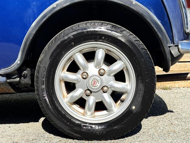 MINI クーパー /禁煙車/革シート/エアコン動作確認/天張り垂れ無し/ETC/12インチクーパーホイール/革巻きステアリング/ウッド調パネル/(37枚目)