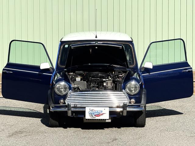 MINI クーパー /禁煙車/革シート/エアコン動作確認/天張り垂れ無し/ETC/12インチクーパーホイール/革巻きステアリング/ウッド調パネル/(41枚目)