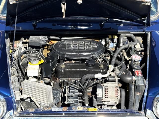 MINI クーパー /禁煙車/革シート/エアコン動作確認/天張り垂れ無し/ETC/12インチクーパーホイール/革巻きステアリング/ウッド調パネル/(43枚目)