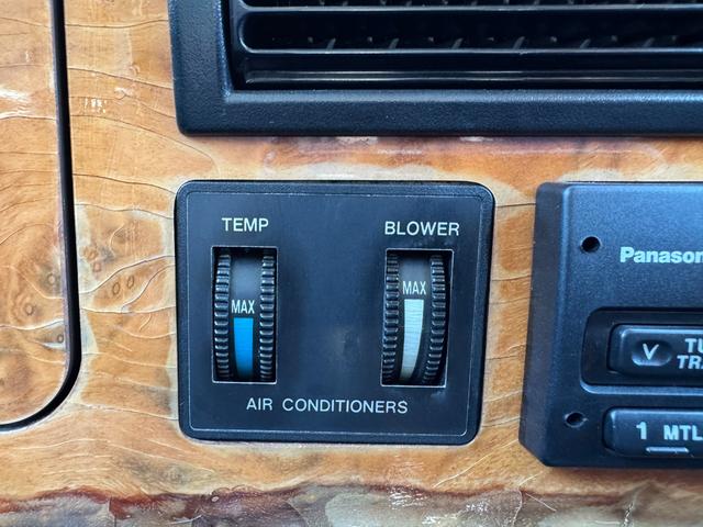 MINI クーパー /禁煙車/革シート/エアコン動作確認/天張り垂れ無し/ETC/12インチクーパーホイール/革巻きステアリング/ウッド調パネル/(51枚目)