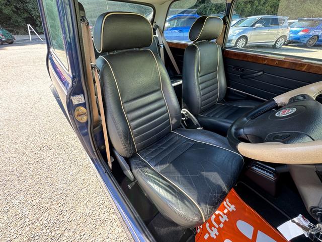 MINI クーパー /禁煙車/革シート/エアコン動作確認/天張り垂れ無し/ETC/12インチクーパーホイール/革巻きステアリング/ウッド調パネル/(57枚目)