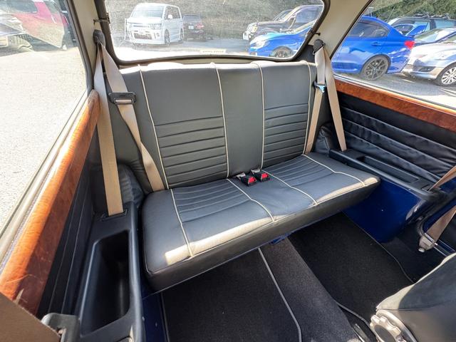 MINI クーパー /禁煙車/革シート/エアコン動作確認/天張り垂れ無し/ETC/12インチクーパーホイール/革巻きステアリング/ウッド調パネル/(68枚目)