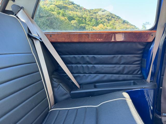 MINI クーパー /禁煙車/革シート/エアコン動作確認/天張り垂れ無し/ETC/12インチクーパーホイール/革巻きステアリング/ウッド調パネル/(71枚目)
