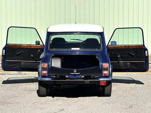 MINI クーパー /禁煙車/革シート/エアコン動作確認/天張り垂れ無し/ETC/12インチクーパーホイール/革巻きステアリング/ウッド調パネル/(75枚目)