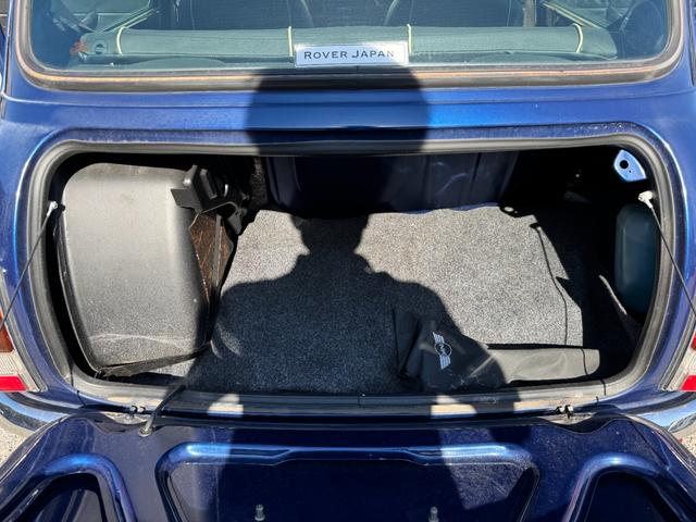 MINI クーパー /禁煙車/革シート/エアコン動作確認/天張り垂れ無し/ETC/12インチクーパーホイール/革巻きステアリング/ウッド調パネル/(76枚目)