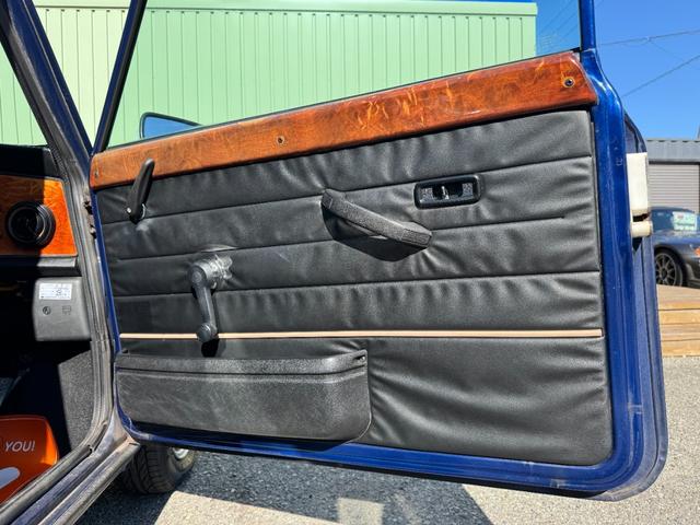 MINI クーパー /禁煙車/革シート/エアコン動作確認/天張り垂れ無し/ETC/12インチクーパーホイール/革巻きステアリング/ウッド調パネル/(80枚目)