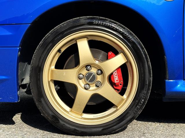 インプレッサ WRX WR-リミテッド 2004 /5MT/TB交換済み/EJ20/大型リアウイング/革巻きMOMOステアリング/17インチホイール/フルセグ/Bluetooth/キーレスエントリー/ETC/(32枚目)