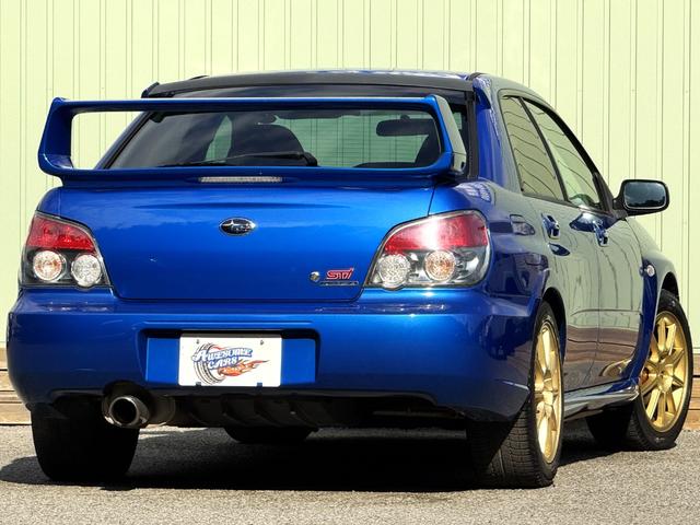 インプレッサ WRX STi /6MT/EJ20/大型リアウイング/HIDヘッドライト/DCCD/17インチホイール/革巻きSTIステアリング/キーレスエントリー/オーディオ/AUX/(2枚目)