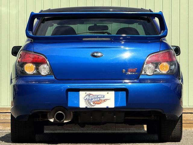 インプレッサ WRX STi /6MT/EJ20/大型リアウイング/HIDヘッドライト/DCCD/17インチホイール/革巻きSTIステアリング/キーレスエントリー/オーディオ/AUX/(7枚目)