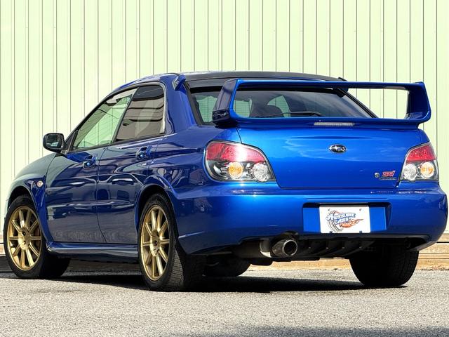 インプレッサ WRX STi /6MT/EJ20/大型リアウイング/HIDヘッドライト/DCCD/17インチホイール/革巻きSTIステアリング/キーレスエントリー/オーディオ/AUX/(11枚目)