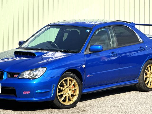インプレッサ WRX STi /6MT/EJ20/大型リアウイング/HIDヘッドライト/DCCD/17インチホイール/革巻きSTIステアリング/キーレスエントリー/オーディオ/AUX/(13枚目)