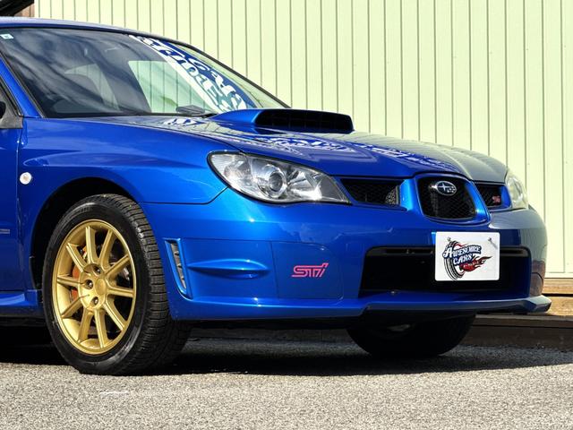 インプレッサ WRX STi /6MT/EJ20/大型リアウイング/HIDヘッドライト/DCCD/17インチホイール/革巻きSTIステアリング/キーレスエントリー/オーディオ/AUX/(15枚目)