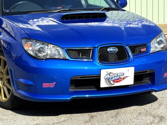 インプレッサ WRX STi /6MT/EJ20/大型リアウイング/HIDヘッドライト/DCCD/17インチホイール/革巻きSTIステアリング/キーレスエントリー/オーディオ/AUX/(21枚目)