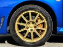 WRX STi /6MT/EJ20/大型リアウイング/HIDヘッドライト/DCCD/17インチホイール/革巻きSTIステアリング/キーレスエントリー/オーディオ/AUX/(30枚目)