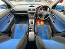 WRX STi /6MT/EJ20/大型リアウイング/HIDヘッドライト/DCCD/17インチホイール/革巻きSTIステアリング/キーレスエントリー/オーディオ/AUX/(44枚目)