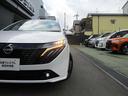 １．２　Ｇ　レザーエディション　日産純正メモリーナビ　プロパイロット　スマ－トキ－　整備記録簿　盗難防止装置　ＥＴＣ車載器　ＡＨＢ　元試乗車　ナビ　追従式クルーズコントロール　レーンキープ　アルミホイール　エアバッグ　エアコン（57枚目）