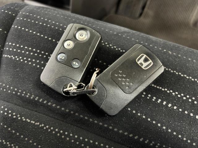 ステップワゴン G Lパッケージ 禁煙車 両側パワースライドドア HDDナビ フルセグTV バックカメラ 18インチアルミ サードシート収納 HIDヘッドライト フォグ スマートキー スペアキー(29枚目)