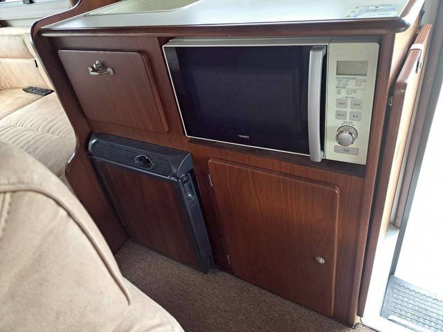 カムロード  ソーラーパック 発電機 インバーター ルームエアコン 電子レンジ シンク 冷蔵庫 バンクベッド ラウンジ 外部電源 ナビ TV Bカメラ ドライブレコーダー ETC(25枚目)
