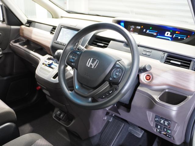 フリード Ｇ・ホンダセンシング　いまコレ＋　禁煙車　ギャザーズメモリー　フルセグ　ＣＤ／ＤＶＤ　ミュージックラック　ホンダセンシング　ＥＴＣ　クルーズコントロール　ウオークスルー　左右パワースライド　アイドリングＳＴＯＰ　盗難防止（36枚目）