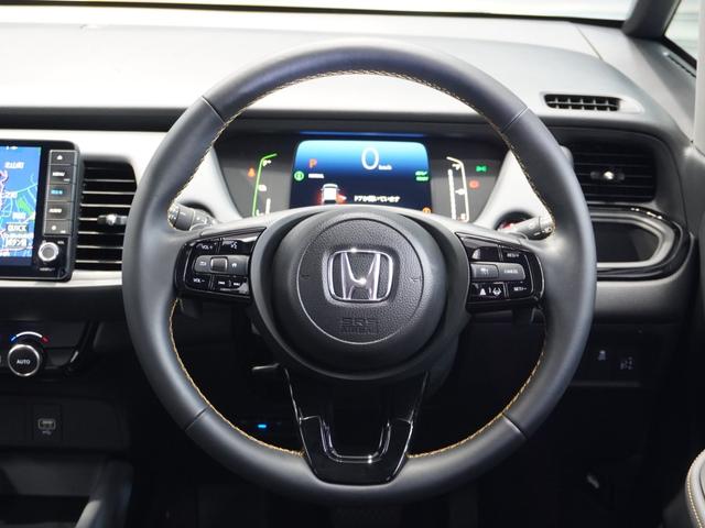 フィット ｅ：ＨＥＶＲＳ　当社デモカー　禁煙車　９インチギャザーズメモリーナビ　フルセグ　ＣＤ／ＤＶＤ　ミュージックラック　ホンダセンシング　ＬＥＤヘッドライト　ＥＴＣ　ドライブレコーダー　前後センサー１６インチアルミホイール（32枚目）