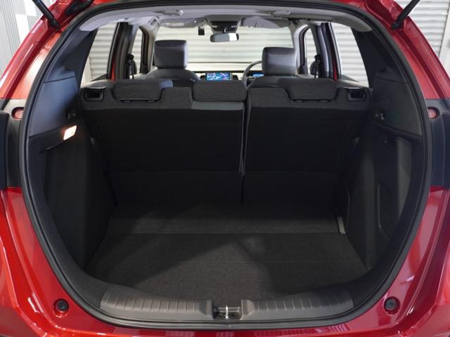 フィット ｅ：ＨＥＶＲＳ　当社デモカー　禁煙車　９インチギャザーズメモリーナビ　フルセグ　ＣＤ／ＤＶＤ　ミュージックラック　ホンダセンシング　ＬＥＤヘッドライト　ＥＴＣ　ドライブレコーダー　前後センサー１６インチアルミホイール（57枚目）