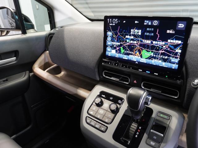 フリード ｅ：ＨＥＶエアーＥＸ　当社デモカー　禁煙車　１１．４インチギャザーズメモリーナビ　フルセグ　ＣＤ／ＤＶＤ　ミュージックラック　ホンダセンシング　ＬＥＤヘッドライト　ＥＴＣ　前後ドライブレコーダー　フロントヒーターシート（42枚目）