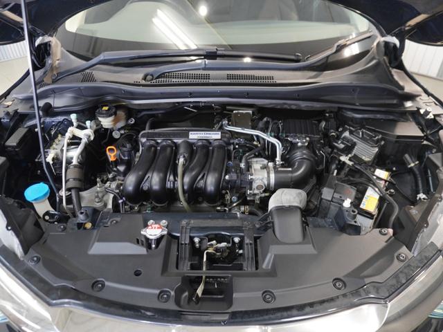 ヴェゼル Ｘ・ホンダセンシング　ワンオーナー車　禁煙車　ギャザーズメモリーナビ　フルセグ　ＣＤ／ＤＶＤ　ミュージックラック　ホンダセンシング　ＬＥＤヘッドライト　ＥＴＣ　クルーズコントロール　１６インチアルミホイール　Ｒカメ　ＡＢＳ（21枚目）