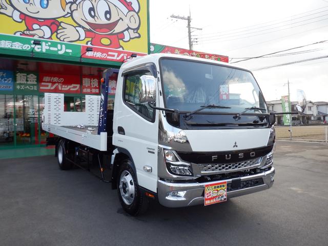 カスタムワイド超ロング極東フラトップ積載車３トン　新規格対応　１７５馬力　純正メッキパーツ　ＥＺＧＯ　左右ヒーター電格リモコンミラー　蛍光灯　電動パーキング　透明シートカバー　マット＆バイザー＆ドアエッジ　６ｃｈラジコン　リヤオートゲート　左右あおり　固縛装置(6枚目)