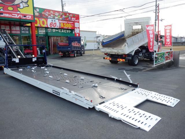 キャンター カスタムワイド超ロング極東フラトップ積載車３トン　新規格対応　１７５馬力　純正メッキパーツ　ＥＺＧＯ　左右ヒーター電格リモコンミラー　蛍光灯　電動パーキング　透明シートカバー　マット＆バイザー＆ドアエッジ　６ｃｈラジコン　リヤオートゲート　左右あおり　固縛装置（19枚目）