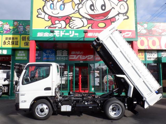 キャンター カスタム新明和セーフティローダーダンプ３トン　新規格対応車　１５０馬力　ＬＥＤオートヘッド　ＥＺＧＯ　左右ヒーター電格リモコンミラー　コボレーン　ラジコン　スマートキー　メッキバンパ＆グリル＆コーナーパネル　透明シートカバー　マット　ドアバイザー＆エッジモール（50枚目）