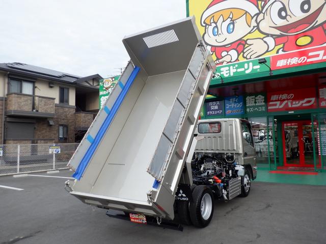 キャンター カスタム新明和セーフティローダーダンプ３トン　新規格対応車　１５０馬力　オートライト　ＥＺＧＯ　左右ヒーター電動格納リモコンミラー　コボレーン　ラジコン　スマートキー　メッキバンパー＆グリル＆コーナーパネル　透明シートカバー　マット　ドアバイザー＆エッジモール（25枚目）