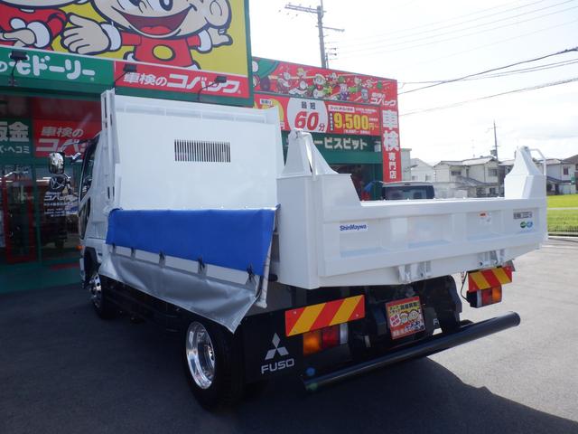 ファイター フルキャブ高機能パッケージ新明和強化ダンプ３．３５トン　２２０馬力　本革シート　純正メッキパーツ　電動コボレーン　リヤダム　中間ピン　鳥居プロテクタ　左右ラダー　純正アルコアアルミ７本　ヒーター付き左電格リモコンミラー　ＥＺＧＯ　キーレス　ベッド　カーテン（11枚目）