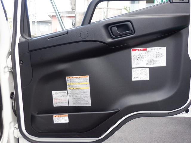 ファイター フルキャブ高機能パッケージ新明和強化ダンプ３．３５トン　２２０馬力　本革シート　純正メッキパーツ　電動コボレーン　リヤダム　中間ピン　鳥居プロテクタ　左右ラダー　純正アルコアアルミ７本　ヒーター付き左電格リモコンミラー　ＥＺＧＯ　キーレス　ベッド　カーテン（38枚目）