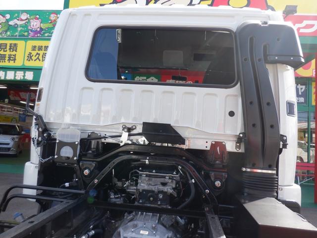 ファイター フルキャブ高機能パッケージ新明和強化ダンプ３．３５トン　２２０馬力　本革シート　純正メッキパーツ　電動コボレーン　リヤダム　中間ピン　鳥居プロテクタ　左右ラダー　純正アルコアアルミ７本　ヒーター付き左電格リモコンミラー　ＥＺＧＯ　キーレス　ベッド　カーテン（59枚目）