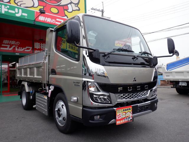 キャンター カスタム新明和セーフティーローダーダンプ３ｔラジコン付　カスタムグレード　新明和セーフティーローダーダンプ３トン積載　オリジナルコボレーン　左右電動格納ミラーヒーター付　スマートキー　透明ビニールシートカバー　マット　バイザ　ｅキャンターインパネ（5枚目）