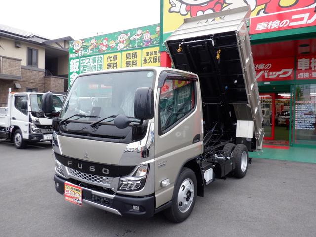 キャンター カスタム新明和セーフティーローダーダンプ３ｔラジコン付　カスタムグレード　新明和セーフティーローダーダンプ３トン積載　オリジナルコボレーン　左右電動格納ミラーヒーター付　スマートキー　透明ビニールシートカバー　マット　バイザ　ｅキャンターインパネ（12枚目）