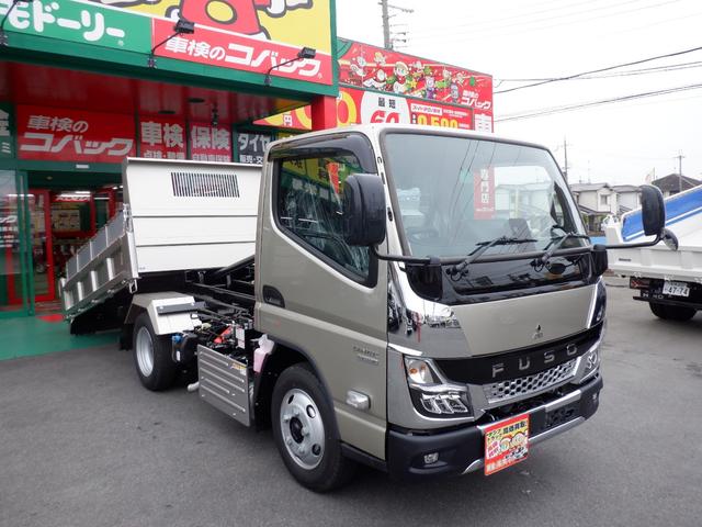 キャンター カスタム新明和セーフティーローダーダンプ３ｔラジコン付　カスタムグレード　新明和セーフティーローダーダンプ３トン積載　オリジナルコボレーン　左右電動格納ミラーヒーター付　スマートキー　透明ビニールシートカバー　マット　バイザ　ｅキャンターインパネ（26枚目）