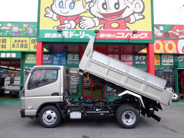 キャンター カスタム新明和セーフティーローダーダンプ３ｔラジコン付　カスタムグレード　新明和セーフティーローダーダンプ３トン積載　オリジナルコボレーン　左右電動格納ミラーヒーター付　スマートキー　透明ビニールシートカバー　マット　バイザ　ｅキャンターインパネ（39枚目）