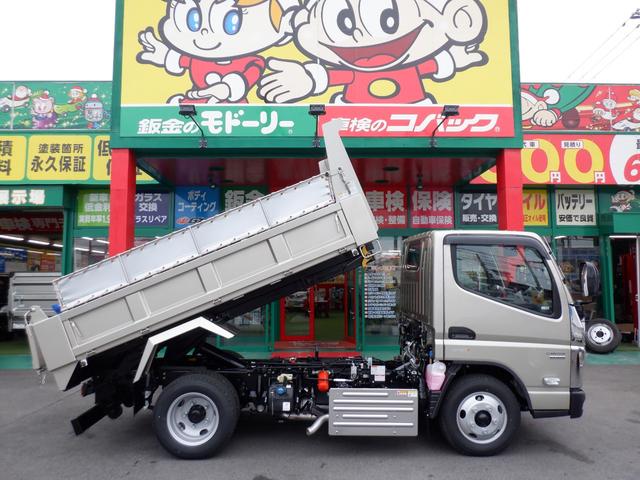 キャンター カスタム新明和セーフティーローダーダンプ３ｔラジコン付　カスタムグレード　新明和セーフティーローダーダンプ３トン積載　オリジナルコボレーン　左右電動格納ミラーヒーター付　スマートキー　透明ビニールシートカバー　マット　バイザ　ｅキャンターインパネ（40枚目）