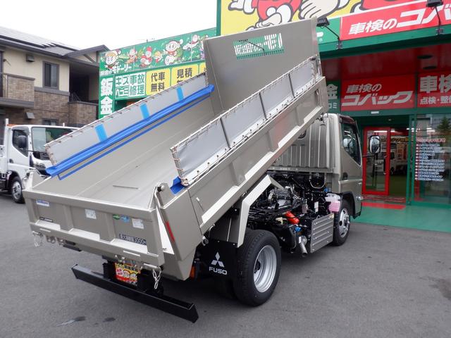 キャンター カスタム新明和セーフティーローダーダンプ３ｔラジコン付　カスタムグレード　新明和セーフティーローダーダンプ３トン積載　オリジナルコボレーン　左右電動格納ミラーヒーター付　スマートキー　透明ビニールシートカバー　マット　バイザ　ｅキャンターインパネ（46枚目）