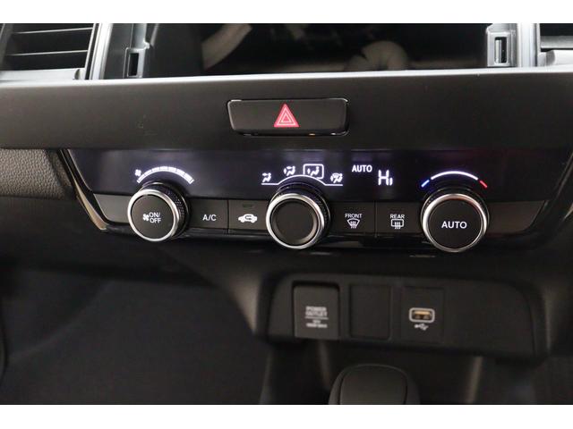 フィット ｅ：ＨＥＶホーム　クリアランスソナー　クルーズコントロール　レーンアシスト　衝突被害軽減システム　オートライト　ＬＥＤヘッドランプ　スマートキー　アイドリングストップ　電動格納ミラー　ＣＶＴ　盗難防止システム（5枚目）