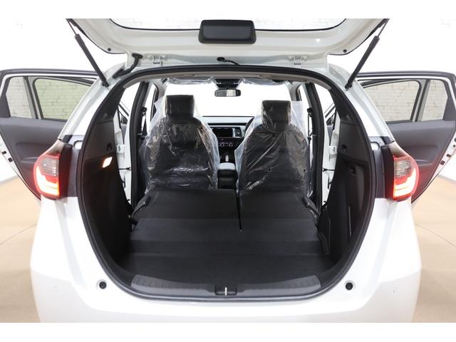 フィット ｅ：ＨＥＶホーム　クリアランスソナー　クルーズコントロール　レーンアシスト　衝突被害軽減システム　オートライト　ＬＥＤヘッドランプ　スマートキー　アイドリングストップ　電動格納ミラー　ＣＶＴ　盗難防止システム（35枚目）