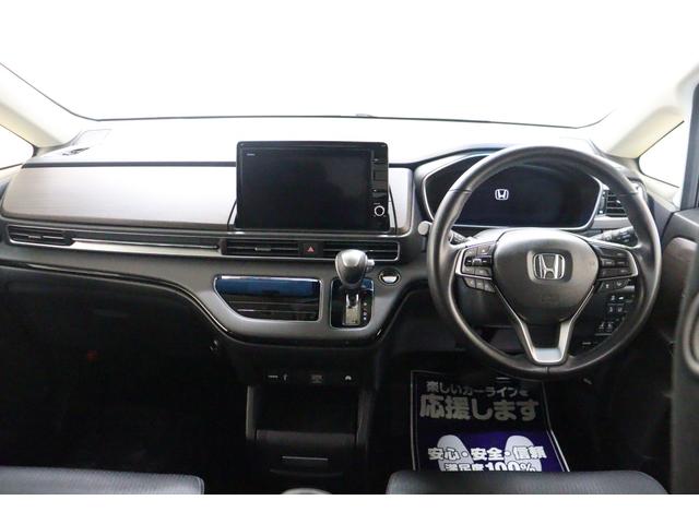 オデッセイハイブリッド ｅ：ＨＥＶアブソルート・ＥＸ　ハイブリッド　ドライブレコーダー　全周囲カメラ　ナビ　ＴＶ　両側電動スライドドア　クリアランスソナー　クルーズコントロール　レーンアシスト　パークアシスト　衝突被害軽減システム　オートライト（2枚目）